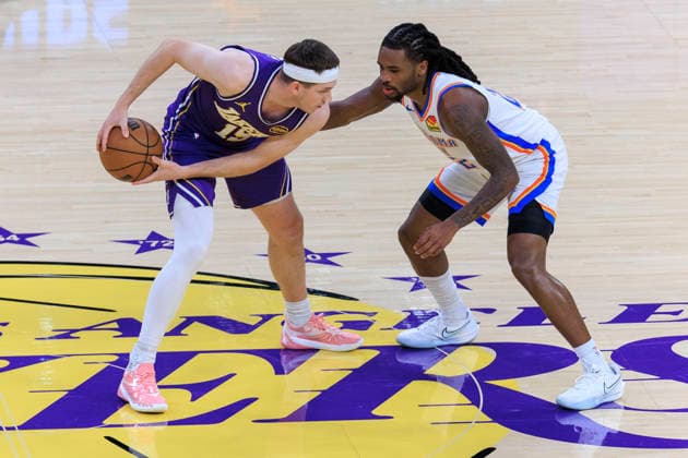 February 9, 2026, Los Angeles, California, USA: Cason Wallace 22 of the Oklahoma City Thunder guards Austin Reaves 15 of the Los Angeles Lakers during their regular season NBA, Basketball Herren, USA game on Monday February 9, 2026 at Crypto.com Arena in Los Angeles, California. ARIANA RUIZ PI Los Angeles USA - ZUMAp124 20260209_zaa_p124_004 Copyright: xArianaxRuizx