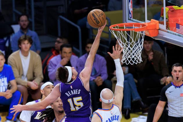 February 9, 2026, Los Angeles, California, USA: Austin Reaves 15 of the Los Angeles Lakers performs a layup as Alex Caruso 9 of the Oklahoma City Thunder defends the basket during their regular season NBA, Basketball Herren, USA game on Monday February 9, 2026 at Crypto.com Arena in Los Angeles, California. ARIANA RUIZ PI Los Angeles USA - ZUMAp124 20260209_zaa_p124_018 Copyright: xArianaxRuizx
