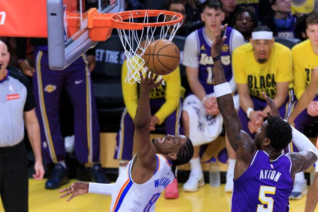 February 9, 2026, Los Angeles, California, USA: Jalen Williams 8 of the Oklahoma City Thunder performs a layup as Deandre Ayton 5 of the Los Angeles Lakers defends the basket during their regular season NBA, Basketball Herren, USA game on Monday February 9, 2026 at Crypto.com Arena in Los Angeles, California. Lakers lose to Thunder, 110-119. ARIANA RUIZ PI Los Angeles USA - ZUMAp124 20260209_zaa_p124_022 Copyright: xArianaxRuizx