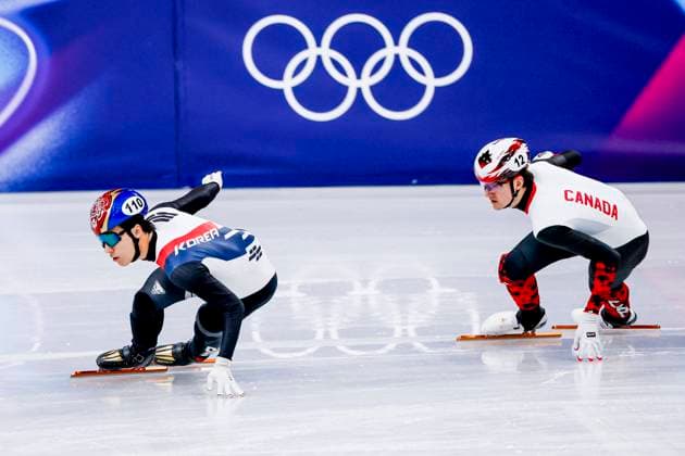 Daeheon Hwang of Republic of Korea and Felix Roussel of Canada Men s 1000m, Milano Cortina 2026 Winter Olympics: Day 4, Short Track Speed skating, Eisschnelllauf - Milano Cortina 2026 Winter Olympics: Day 4, Milano Speed Skating Stadium, February 10, 2026, Milan, Italy.