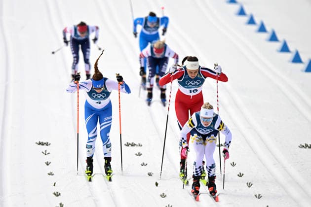 LKS 20260210 Jasmi Joensuu (L) of Finland competes during the women s Sprint Classic Quarter Finals at the Milano Cortina Winter Olympics at the Tesero Cross Country Skiing Stadium on February 10, 2026. - RONI REKOMAA Tesero Italy L8uIhIjSXgw  Copyright: xRonixRekomaax L8uIhIjSXgw