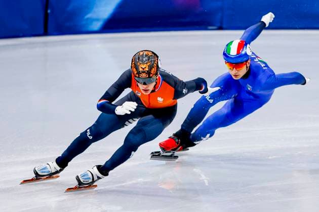 Jens van t Wout of the Netherlands and Pietro Sighel of Italy Mixed Team Relay Quarterfinals, Milano Cortina 2026 Winter Olympics: Day 4, Short Track Speed skating, Eisschnelllauf - Milano Cortina 2026 Winter Olympics: Day 4, Milano Speed Skating Stadium, February 10, 2026, Milan, Italy.