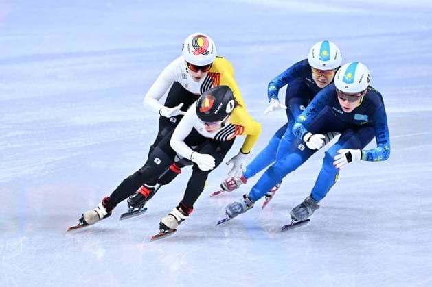 Belgian shorttrack skater Tineke den Dulk and Belgian shorttrack skater Hanne Desmet pictured in action during the quarterfinals of the Mixed Team Relay of the Short Track Speed skating, Eisschnelllauf competition at the Milano Cortina 2026 Olympic Winter games, Winterspiele,Spiele, Summer games on Tuesday 10 February 2026 in Milan, Italy. The XXV Winter Olympics take place from 6 to 22 February 2026 in Italy. JASPERxJACOBS  x162363090x