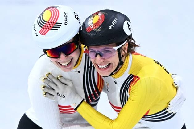 Belgian shorttrack skater Tineke den Dulk and Belgian shorttrack skater Hanne Desmet celebrate after the semifinals of the Mixed Team Relay of the Short Track Speed skating, Eisschnelllauf competition at the Milano Cortina 2026 Olympic Winter games, Winterspiele,Spiele, Summer games on Tuesday 10 February 2026 in Milan, Italy. The XXV Winter Olympics take place from 6 to 22 February 2026 in Italy. JASPERxJACOBS  x162368836x