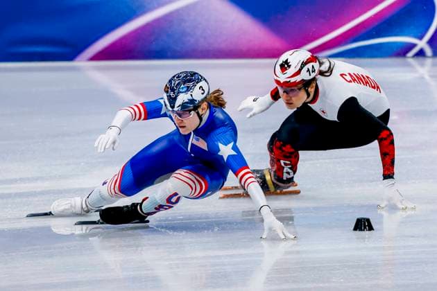 Corinne Stoddard of United States of America and Courtney Sarault of Canada Mixed Team Relay Semifinals, Milano Cortina 2026 Winter Olympics: Day 4, Short Track Speed skating, Eisschnelllauf - Milano Cortina 2026 Winter Olympics: Day 4, Milano Speed Skating Stadium, February 10, 2026, Milan, Italy.