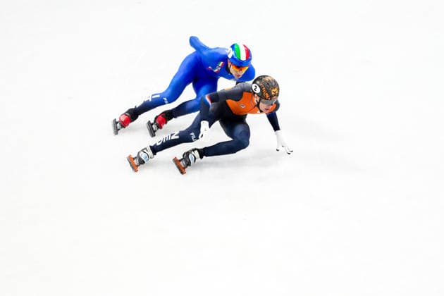 2026-02-10 - Milano Cortina 2026 Winter Olympics MILAN, ITALY - FEBRUARY 10: Jens van t Wout of Netherlands, Pietro Sighel of Italy performing on the Mixed Team Relay - Quarterfinals during the Milano Cortina 2026 Winter Olympics at the Milano Ice Skating Arena on February 10, 2026 in Milan, Italy Milan Milano Ice Skating Arena Italy Content not available for redistribution in The Netherlands directly or indirectly through any third parties. Copyright: xAndrexWeeningx