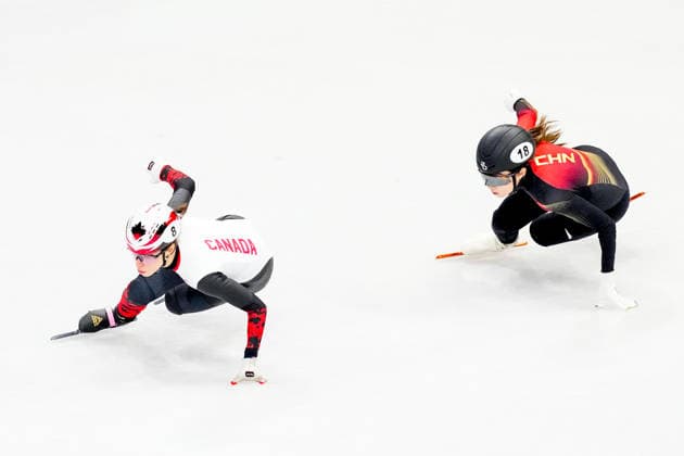 2026-02-10 - Milano Cortina 2026 Winter Olympics MILAN, ITALY - FEBRUARY 10: Florence Brunelle of Canada, Li Gong of China performing on the Mixed Team Relay - Quarterfinals during the Milano Cortina 2026 Winter Olympics at the Milano Ice Skating Arena on February 10, 2026 in Milan, Italy Milan Milano Ice Skating Arena Italy Content not available for redistribution in The Netherlands directly or indirectly through any third parties. Copyright: xAndrexWeeningx