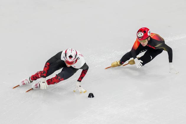 2026-02-10 - Milano Cortina 2026 Winter Olympics MILAN, ITALY - FEBRUARY 10: William Dandjinou of Canada, Xiaojun Lin of China performing on the Mixed Team Relay - Quarterfinals during the Milano Cortina 2026 Winter Olympics at the Milano Ice Skating Arena on February 10, 2026 in Milan, Italy Milan Milano Ice Skating Arena Italy Content not available for redistribution in The Netherlands directly or indirectly through any third parties. Copyright: xAndrexWeeningx