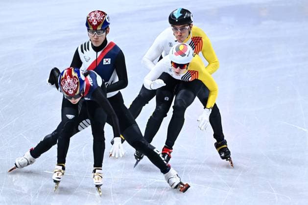 Belgian shorttrack skater Tineke den Dulk and Belgian shorttrack skater Stijn Desmet pictured in action during the semifinals of the Mixed Team Relay of the Short Track Speed skating, Eisschnelllauf competition at the Milano Cortina 2026 Olympic Winter games, Winterspiele,Spiele, Summer games on Tuesday 10 February 2026 in Milan, Italy. The XXV Winter Olympics take place from 6 to 22 February 2026 in Italy. JASPERxJACOBS  x162369319x
