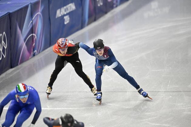 Winter Olympics - Short Track Speed skating, Eisschnelllauf Mixed Team Relay Long Sun of Team People s Republic of China and Etienne Bustier of France during the Mixed relay short track event Milano Cortina 2026 Winter Olympics - Day 6 on February 10, 2026 at the Ice Skating Arena in Milan, Italy. Photo by JMP ABACAPRESS.COM Milan Italy  Copyright: xJMP ABACAx