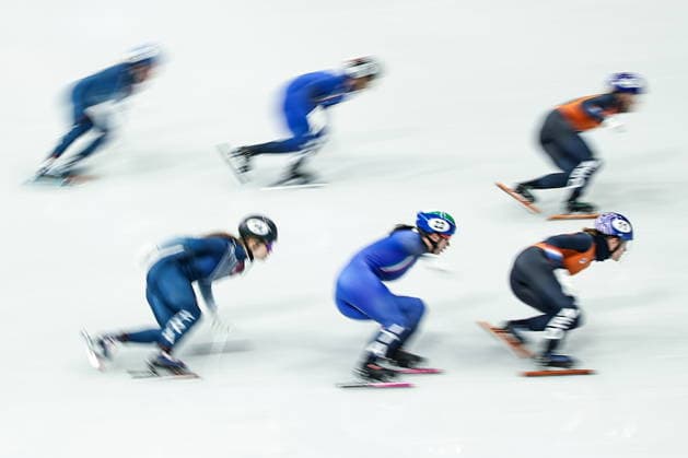 ITALY, MILAN - FEBRUARY 10, 2026: Chiara Betti (C front) of Italy and Michelle Velzeboer (R) of the Netherlands compete in a short track Speed skating, Eisschnelllauf mixed team relay semifinal during the 2026 Winter Olympic Games, Olympische Spiele, Olympia, OS at the Milano Ice Skating Arena. Mikhail Tereshchenko TASS  88478614