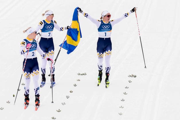 Winter Olympics in Milan Cortina 2026 Val di Fiemme, Italy 20260210. Jonna Sundling from Sweden, Maja Dahlqvist from Sweden and Linn Svahn from Sweden cheer during the cross-country sprint finals at Lago di Tesero during the Winter Olympics in Milano Cortina 2026. Photo: Terje Pedersen NTB Val di Fiemme Italy EDITORIAL USE ONLY. RESTRICTED USE FOR BETTING COMPANIES Ref:_SPObvzLL7bMEuM.jpg *** Winter Olympics in Milan Cortina 2026 Val di Fiemme, Italy 20260210 Jonna Sundling from Sweden, Maja Dahlqvist from Sweden and Linn Svahn from Sweden cheer during the cross country sprint finals at Lago di Tesero during the Winter Olympics in Milano Cortina 2026 Photo Terje Pedersen NTB Val di Fiemme Italy EDITORIAL USE ONLY RESTRICTED USE FOR BETTING COMPANIES  Copyright: xTerjexPedersenx xNTBx
