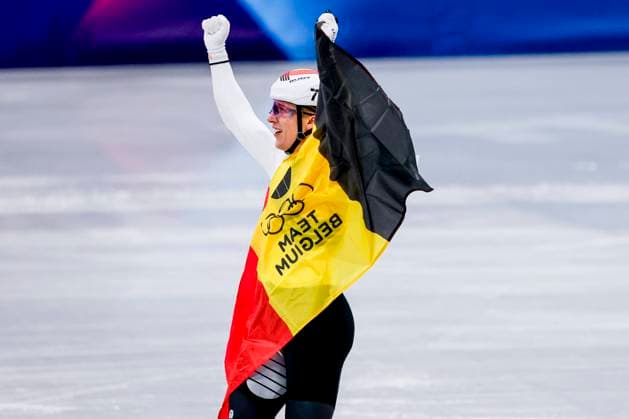 third team of Belgium and Ward Petre of Belgium celebrating and holding flag after Mixed Team Relay Finals, Milano Cortina 2026 Winter Olympics: Day 4, Short Track Speed skating, Eisschnelllauf - Milano Cortina 2026 Winter Olympics: Day 4, Milano Speed Skating Stadium, February 10, 2026, Milan, Italy.