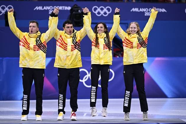Belgian shorttrack skater Ward Petre, Belgian shorttrack skater Stijn Desmet, Belgian shorttrack skater Hanne Desmet and Belgian shorttrack skater Tineke den Dulk celebrate their bronze medal on the podium of the Mixed Team Relay of the Short Track Speed skating, Eisschnelllauf competition at the Milano Cortina 2026 Olympic Winter games, Winterspiele,Spiele, Summer games on Tuesday 10 February 2026 in Milan, Italy. The XXV Winter Olympics take place from 6 to 22 February 2026 in Italy. JASPERxJACOBS  x162382534x