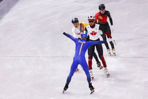MILAN , 10-02-2026 , Milano Ice Skating Arena , season 2025 2026 , Olympic Winter games, Winterspiele,Spiele, Summer games 2026 - Short Track 10-02, Picture shows mixed relay Pietro Sighel finishes backwards and makes Italy Olympic champion Olympic Winter Games 2026 - Short Track 10-02  x201460894x Copyright: