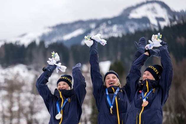 260210 Jonna Sundling of Sweden, Linn Svahn of Sweden and Maja Dahlqvist of Sweden celebrate on the podium after women s classic technique cross-country skiing sprint final during day 4 of the 2026 Winter Olympics on February 10, 2026 in Val di Fiemme. Photo: Joel Marklund BILDBYRAN kod JM MT0969 skidor cross-country skiing langrenn Olympic Games, Olympische Spiele, Olympia, OS olympics winter olympics os ol olympiska spel vinter-os olympiske leker milano cortina 2026 milan cortina 2026 milano cortina 2026 olympic games milano cortina 2026 winter olympic games milano cortina-os milano cortina-ol vinter-ol 4 bbeng sprint jubel sverige os-guld guld gold silver bronze *** 260210 Jonna Sundling of Sweden, Linn Svahn of Sweden and Maja Dahlqvist of Sweden celebrate on the podium after women s classic technique cross country skiing sprint final during day 4 of the 2026 Winter Olympics on February 10, 2026 in Val di Fiemme Photo Joel Marklund BILDBYRAN kod JM MT0969 skidor cross country skiing langrenn olympic games olympics winter olympics os ol olympiska spel vinter os olympiske leker milano cortina 2026 milan cortina 2026 milano cortina 2026 olympic games milano cortina 2026 winter olympic games milano cortina os milano cortina ol vinter ol 4 bbeng sprint jubel sverige os guld guld silver bronze  Copyright: JOELxMARKLUND BB260210JM149