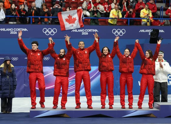 February 10, 2026, Milan, Lombardy, Italy: FELIX ROUSSEL, STEVEN DUBOIS, WILLIAM DANDJINOU, COURTNEY SARAULT, FLORENCE BRUNELLE and KIM BOUTIN of Team Canada celebrate winning the silver medal in the Mixed Team Relay final of the Short Track Speed skating, Eisschnelllauf at the Milano Cortina 2026 Winter Olympic Games, Olympische Spiele, Olympia, OS Milan Italy - ZUMAc179 20260210_oly_c179_044 Copyright: xMickaelxChavetx