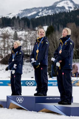 260210 Jonna Sundling of Sweden, Linn Svahn of Sweden and Maja Dahlqvist of Sweden celebrate on the podium after the women s classic technique cross-country skiing sprint final during day 4 of the 2026 Winter Olympics on February 10, 2026 in Val di Fiemme. Photo: Joel Marklund BILDBYRAN kod JM MT0969 skidor cross-country skiing langrenn Olympic Games, Olympische Spiele, Olympia, OS olympics winter olympics os ol olympiska spel vinter-os olympiske leker milano cortina 2026 milan cortina 2026 milano cortina 2026 olympic games milano cortina 2026 winter olympic games milano cortina-os milano cortina-ol vinter-ol 4 bbeng sprint jubel sverige guld silver brons bronze gold os-guld *** 260210 Jonna Sundling of Sweden, Linn Svahn of Sweden and Maja Dahlqvist of Sweden celebrate on the podium after the women s classic technique cross country skiing sprint final during day 4 of the 2026 Winter Olympics on February 10, 2026 in Val di Fiemme Photo Joel Marklund BILDBYRAN code JM MT0969 skiing cross country skiing cross country olympic games olympics winter olympics os ol olympiska spel vinter os olympiske leker milano cortina 2026 milan cortina 2026 milano cortina 2026 olympic games milano cortina 2026 winter olympic games milano cortina os milano cortina ol vinter ol 4 bbeng sprint jubel sverige guld silver bronz bronze gold os guld  Copyright: JOELxMARKLUND BB260210JM158