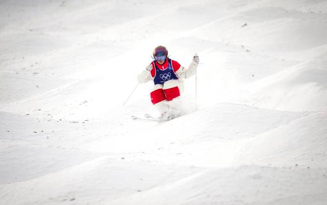 February 10, 2026, Livigno, Italy: Canada s Maia Schwinghammer from Saskatoon, Sask., competes in the women s moguls qualification at the Milano Cortina 2026 Winter Olympic Games, Olympische Spiele, Olympia, OS in Livigno, Italy on Tuesday, Feb. 10, 2026. Canada News - February 10, 2026  - ZUMAc35_ 20260210_zaf_c35_085 Copyright: xSeanxKilpatrickx
