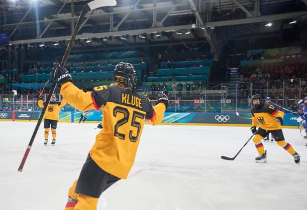 Emily Nix of Germany celebrates 1-1 goal, happy, laugh, celebration, with Laura Kluge of Germany at the preliminary women Ice hockey, Eishockey match Group B Germany - Italy of the Milano Cortina 2026 Winter Olympic Games, Olympische Spiele, Olympia, OS at Milano Rho Ice Hockey Arena on February 10, 2026 in Milan, Italy.