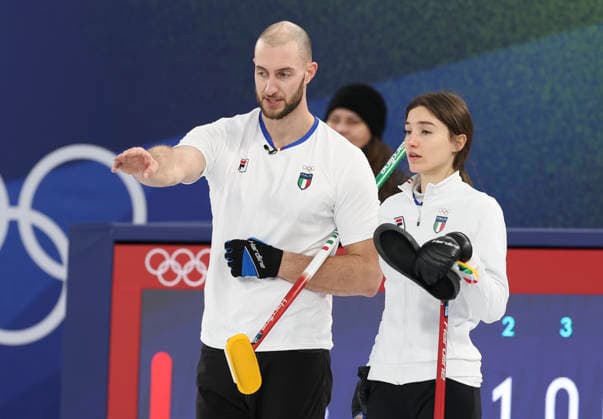 (260210) -- CORTINA D AMPEZZO, Feb. 10, 2026 -- Stefania Constantini (R) Amos Mosaner of Italy compete during the curling mixed doubles bronze medal match between Britain and Italy at the Milan-Cortina 2026 Olympic Winter games, Winterspiele,Spiele, Summer games in Cortina, Italy, Feb. 10, 2026. ) (MICO2026)ITALY-CORTINA D AMPEZZO-OLYMPIC WINTER GAMES-CURLING-MIXED DOUBLES-BRONZE MEDAL MATCH-GBR VS ITA DingxXu 