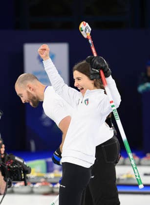(260210) -- CORTINA D AMPEZZO, Feb. 10, 2026 -- Stefania Constantini (R) Amos Mosaner of Italy celebrate during the curling mixed doubles bronze medal match between Britain and Italy at the Milan-Cortina 2026 Olympic Winter games, Winterspiele,Spiele, Summer games in Cortina, Italy, Feb. 10, 2026. ) (MICO2026)ITALY-CORTINA D AMPEZZO-OLYMPIC WINTER GAMES-CURLING-MIXED DOUBLES-BRONZE MEDAL MATCH-GBR VS ITA DingxXu 