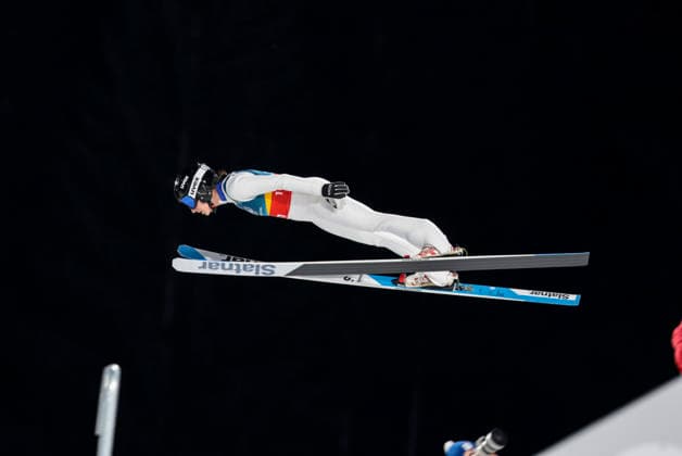 OLYMPICS - Winter Olympic Games, Olympische Spiele, Olympia, OS Milano Cortina 2026 PREDAZZO,ITALY,10.FEB.26 - OLYMPICS, Ski jumping, Skispringen, Ski, nordisch - Winter Olympic Games Milano Cortina 2026, normal hill, mixed team. Image shows Delia Anamaria Folea (ROU).  GEPAxpictures xMatthiasxTrinkl