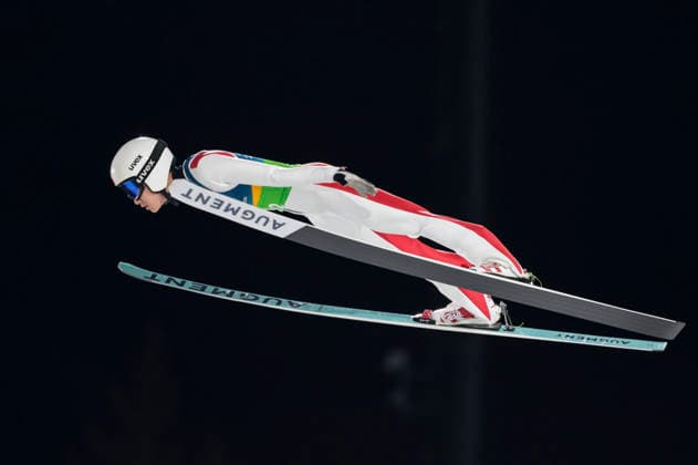 OLYMPICS - Winter Olympic Games, Olympische Spiele, Olympia, OS Milano Cortina 2026 PREDAZZO,ITALY,10.FEB.26 - OLYMPICS, Ski jumping, Skispringen, Ski, nordisch - Winter Olympic Games Milano Cortina 2026, normal hill, mixed team. Image shows Qiwu Song (CHN).  GEPAxpictures xMatthiasxTrinkl