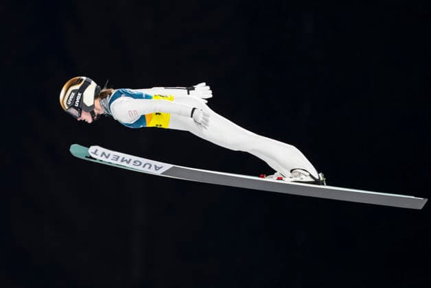 OLYMPICS - Winter Olympic Games, Olympische Spiele, Olympia, OS Milano Cortina 2026 PREDAZZO,ITALY,10.FEB.26 - OLYMPICS, Ski jumping, Skispringen, Ski, nordisch - Winter Olympic Games Milano Cortina 2026, normal hill, mixed team. Image shows Julia Muehlbacher (AUT).  GEPAxpictures xMatthiasxTrinkl