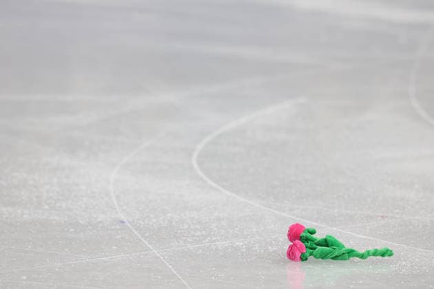 February 10, 2026, Milan, Lombardy, Italy: Gift are thrown on the ice rink for PETR GUMMENIK of the Individual Neutral Athletes team (AIN) in the Men s Single Skating short program of the Figure skating, Eiskunstlauf Team Event at the Milano Cortina 2026 Winter Olympic Games, Olympische Spiele, Olympia, OS Olympics 2026: Milano Cortina: Figure Skating Men S Single Skating  - ZUMAc179 20260210_oly_c179_191 Copyright: xMickaelxChavetx