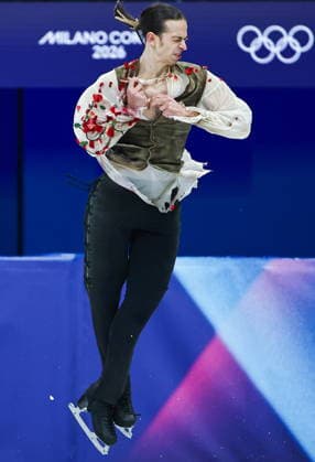 ITALY, MILAN - FEBRUARY 10, 2026: Petr Gumennik of Russia performs his short programme in the men s single skating event during the 2026 Winter Olympic Games, Olympische Spiele, Olympia, OS at the Milano Ice Skating Arena. Mikhail Tereshchenko TASS  88495815