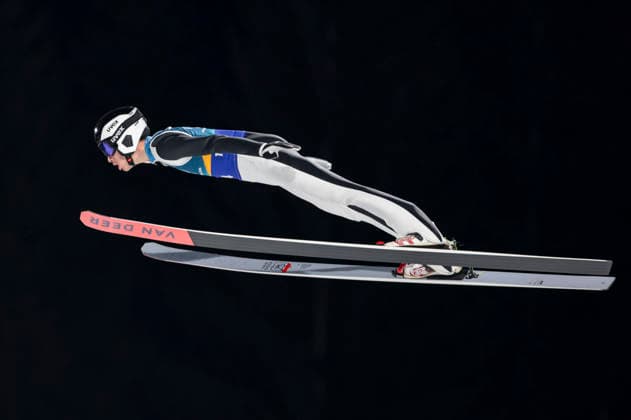 OLYMPICS - Winter Olympic Games, Olympische Spiele, Olympia, OS Milano Cortina 2026 PREDAZZO,ITALY,10.FEB.26 - OLYMPICS, Ski jumping, Skispringen, Ski, nordisch - Winter Olympic Games Milano Cortina 2026, normal hill, mixed team. Image shows Daniel Andrei Cacina (ROU).  GEPAxpictures xMatthiasxTrinkl