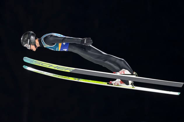 OLYMPICS - Winter Olympic Games, Olympische Spiele, Olympia, OS Milano Cortina 2026 PREDAZZO,ITALY,10.FEB.26 - OLYMPICS, Ski jumping, Skispringen, Ski, nordisch - Winter Olympic Games Milano Cortina 2026, normal hill, mixed team. Image shows Jiawen Zhao (CHN).  GEPAxpictures xMatthiasxTrinkl