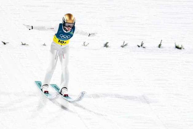 OLYMPICS - Winter Olympic Games, Olympische Spiele, Olympia, OS Milano Cortina 2026 PREDAZZO,ITALY,10.FEB.26 - OLYMPICS, Ski jumping, Skispringen, Ski, nordisch - Winter Olympic Games Milano Cortina 2026, normal hill, mixed team. Image shows Julia Muehlbacher (AUT).  GEPAxpictures xMatthiasxTrinkl
