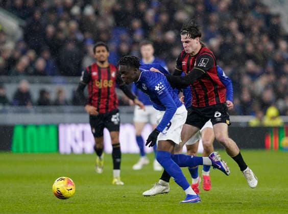 Liverpool, England, 10th February 2026. Tyrique George of Everton tackled by Alex Scott of Bournemouth during the Everton vs AFC Bournemouth Premier League match at Hill Dickinson Stadium, Liverpool. Picture credit should read: Andrew Yates Sportimage EDITORIAL USE ONLY. No use with unauthorised audio, video, data, fixture lists, club league logos or live services. Online in-match use limited to 120 images, no video emulation. No use in betting, games or single club league player publications. SPI_016_AY_Everton_Leeds SPI-4516-0014