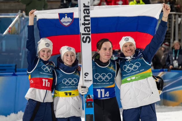 OLYMPICS - Winter Olympic Games, Olympische Spiele, Olympia, OS Milano Cortina 2026 VAL DI FIEMME,ITALY,10.FEB.26 - OLYMPICS, Ski jumping, Skispringen, Ski, nordisch - Winter Olympic Games Milano Cortina 2026, normal hill, mixed team. Image shows the rejoicing of Nika Vodan. Nika Prevc, Domen Prevc and Anze Lanisek (SLO).  GEPAxpictures xOliverxLerch