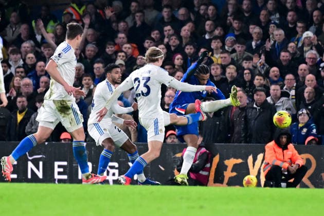 Chelsea v Leeds United, Premier League Chelsea forward Joao Pedro (20) takes a shot at goal under pressure from Leeds United defender Sebastiaan Bornauw (23) during the Premier League match between Chelsea and Leeds United at Stamford Bridge, London, UK on 10 February 2026. London Stamford Bridge Greater London UK Editorial use only DataCo restrictions apply See www.football-dataco.com , Copyright: xDennisxGoodwinx PSI-23726-0031