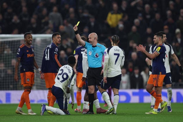 Tottenham Hotspur v Newcastle United, Premier League Yellow Card shown by Match Referee Anthony Taylor to Newcastle United Midfielder Jacob Ramsey (41) during the Premier League match between Tottenham Hotspur and Newcastle United at Tottenham Hotspur Stadium, London, UK on 10 February 2026. London Tottenham Hotspur Stadium London UK Editorial use only DataCo restrictions apply See www.football-dataco.com , Copyright: xChrisxFoxwellx PSI-23717-0017
