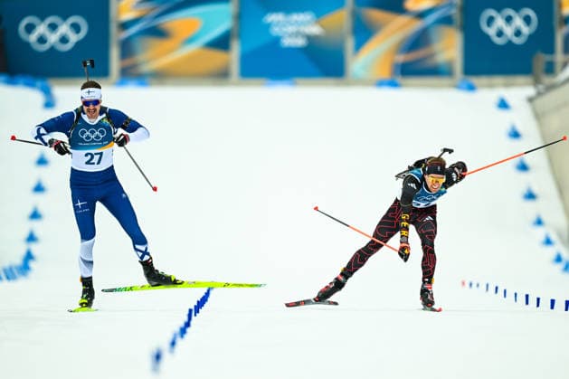 (260210) -- ANTERSELVA, Feb. 10, 2026 -- Olli Hiidensalo (L) of Finland and David Zobel of Germany compete during the biathlon men s 20km individual at the Milan-Cortina 2026 Olympic Winter games, Winterspiele,Spiele, Summer games in Anterselva, Italy, Feb. 10, 2026. ) (MICO2026)ITALY-ANTERSELVA-OLYMPIC WINTER GAMES-BIATHLON-MEN S 20KM INDIVIDUAL JiangxHan 