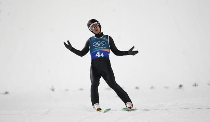 (260210) -- PREDAZZO, Feb. 10, 2026 -- Zhao Jiawen of China competes during the Ski jumping, Skispringen, Ski, nordisch mixed team match at the Milan-Cortina 2026 Olympic Winter games, Winterspiele,Spiele, Summer games in Predazzo, Italy, Feb. 10, 2026. ) (MICO2026)ITALY-PREDAZZO-OLYMPIC WINTER GAMES-SKI JUMPING-MIXED TEAM HuangxWei 