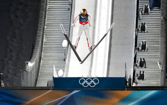 (260210) -- PREDAZZO, Feb. 10, 2026 -- Zeng Ping of China competes during the Ski jumping, Skispringen, Ski, nordisch mixed team match at the Milan-Cortina 2026 Olympic Winter games, Winterspiele,Spiele, Summer games in Predazzo, Italy, Feb. 10, 2026. ) (MICO2026)ITALY-PREDAZZO-OLYMPIC WINTER GAMES-SKI JUMPING-MIXED TEAM HuangxWei 