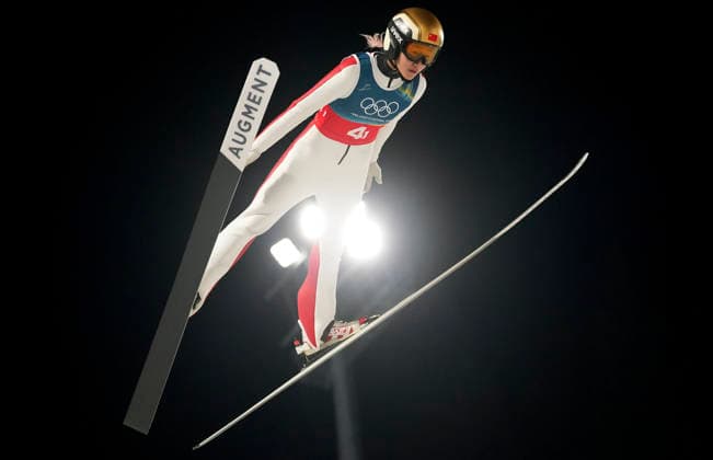 (260210) -- PREDAZZO, Feb. 10, 2026 -- Zeng Ping of China competes during the Ski jumping, Skispringen, Ski, nordisch mixed team match at the Milan-Cortina 2026 Olympic Winter games, Winterspiele,Spiele, Summer games in Predazzo, Italy, Feb. 10, 2026. ) (MICO2026)ITALY-PREDAZZO-OLYMPIC WINTER GAMES-SKI JUMPING-MIXED TEAM MengxYongmin 