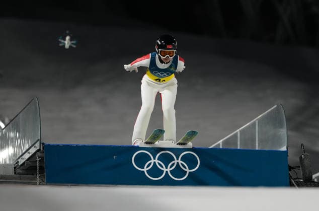 (260210) -- PREDAZZO, Feb. 10, 2026 -- Liu Qi of China competes during the Ski jumping, Skispringen, Ski, nordisch mixed team match at the Milan-Cortina 2026 Olympic Winter games, Winterspiele,Spiele, Summer games in Predazzo, Italy, Feb. 10, 2026. ) (MICO2026)ITALY-PREDAZZO-OLYMPIC WINTER GAMES-SKI JUMPING-MIXED TEAM MengxYongmin 