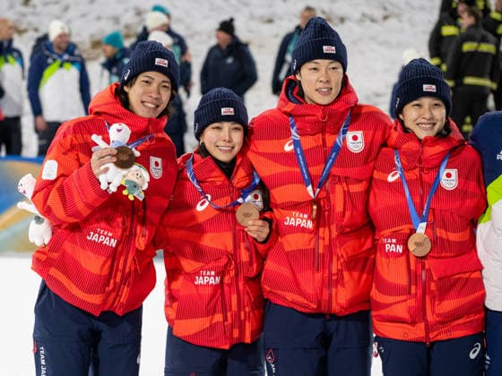 OLYMPICS - Winter Olympic Games, Olympische Spiele, Olympia, OS Milano Cortina 2026 VAL DI FIEMME,ITALY,10.FEB.26 - OLYMPICS, Ski jumping, Skispringen, Ski, nordisch - Winter Olympic Games Milano Cortina 2026, normal hill, mixed team. Image shows Ren Nikaido, Sara Takanashi, Ryoyu Kobayashi and Nozomi Maruyama (JPN) with their medals.  GEPAxpictures xOliverxLerch