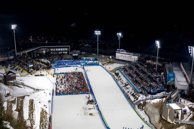 OLYMPICS - Winter Olympic Games, Olympische Spiele, Olympia, OS Milano Cortina 2026 PREDAZZO,ITALY,10.FEB.26 - OLYMPICS, Ski jumping, Skispringen, Ski, nordisch - Winter Olympic Games Milano Cortina 2026, normal hill, mixed team. Image shows an overview of the stadium.  GEPAxpictures xMatthiasxTrinkl