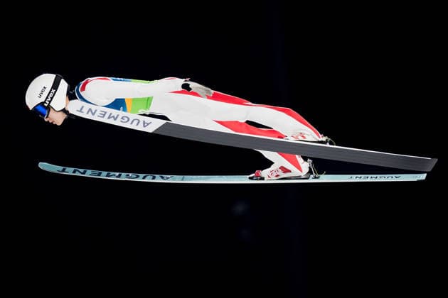OLYMPICS - Winter Olympic Games, Olympische Spiele, Olympia, OS Milano Cortina 2026 PREDAZZO,ITALY,10.FEB.26 - OLYMPICS, Ski jumping, Skispringen, Ski, nordisch - Winter Olympic Games Milano Cortina 2026, normal hill, mixed team. Image shows Qiwu Song (CHN).  GEPAxpictures xMatthiasxTrinkl