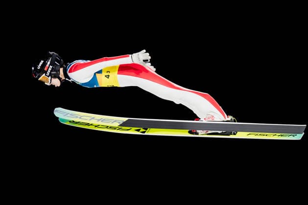 OLYMPICS - Winter Olympic Games, Olympische Spiele, Olympia, OS Milano Cortina 2026 PREDAZZO,ITALY,10.FEB.26 - OLYMPICS, Ski jumping, Skispringen, Ski, nordisch - Winter Olympic Games Milano Cortina 2026, normal hill, mixed team. Image shows Qi Liu (CHN).  GEPAxpictures xMatthiasxTrinkl
