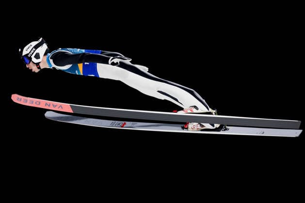 OLYMPICS - Winter Olympic Games, Olympische Spiele, Olympia, OS Milano Cortina 2026 PREDAZZO,ITALY,10.FEB.26 - OLYMPICS, Ski jumping, Skispringen, Ski, nordisch - Winter Olympic Games Milano Cortina 2026, normal hill, mixed team. Image shows Daniel Andrei Cacina (ROU).  GEPAxpictures xMatthiasxTrinkl