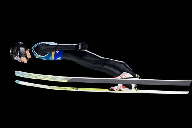 OLYMPICS - Winter Olympic Games, Olympische Spiele, Olympia, OS Milano Cortina 2026 PREDAZZO,ITALY,10.FEB.26 - OLYMPICS, Ski jumping, Skispringen, Ski, nordisch - Winter Olympic Games Milano Cortina 2026, normal hill, mixed team. Image shows Jiawen Zhao (CHN).  GEPAxpictures xMatthiasxTrinkl