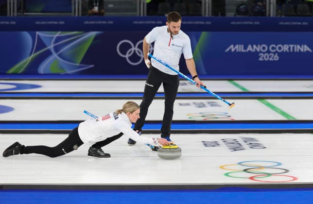 (260210) -- CORTINA D AMPEZZO, Feb. 10, 2026 -- Cory Thiesse (L) and Korey Dropkin of the United States competes during the curling mixed doubles gold medal match between Sweden and the United States at the Milan-Cortina 2026 Olympic Winter games, Winterspiele,Spiele, Summer games in Cortina, Italy, Feb. 10, 2026. ) (MICO2026)ITALY-CORTINA D AMPEZZO-OLYMPIC WINTER GAMES-CURLING-MIXED DOUBLES-GOLD MEDAL MATCH-SWE VS USA DingxXu 